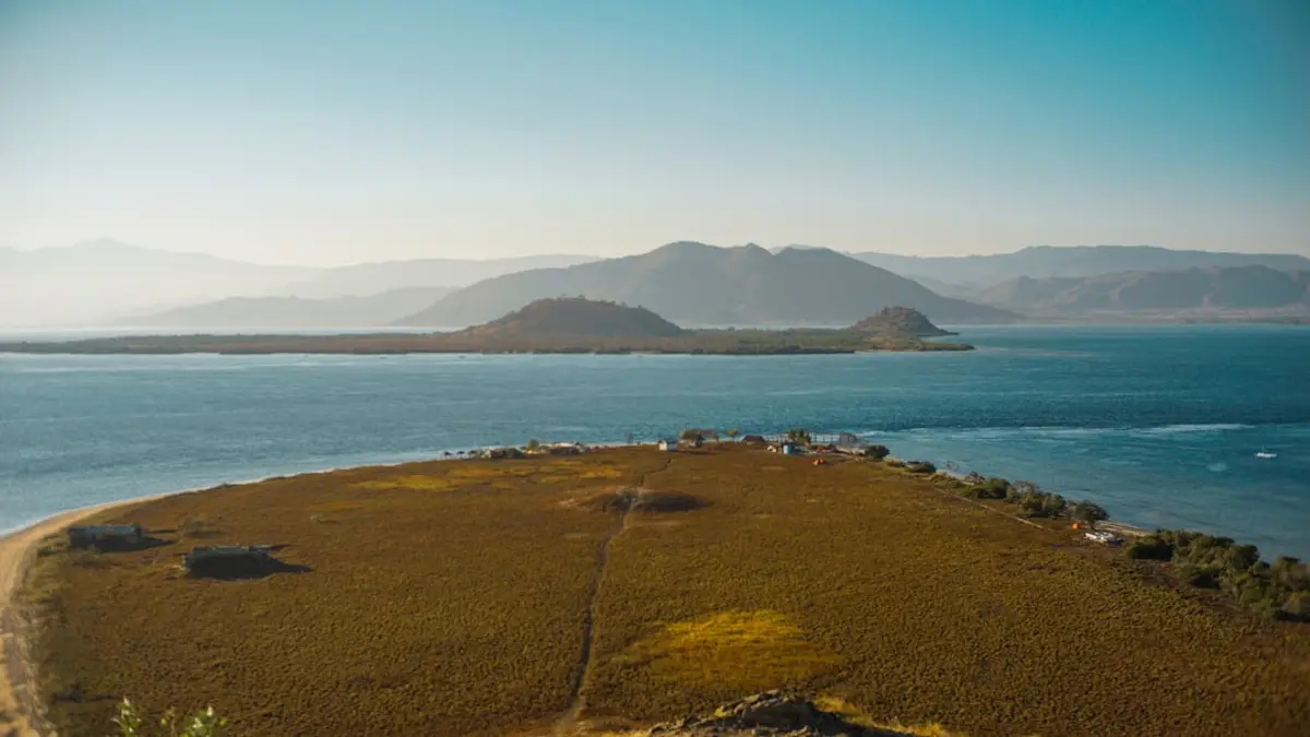 Turquoise water and jungle-fringed coastline of Moyo Island, north of Sumbawa Besar